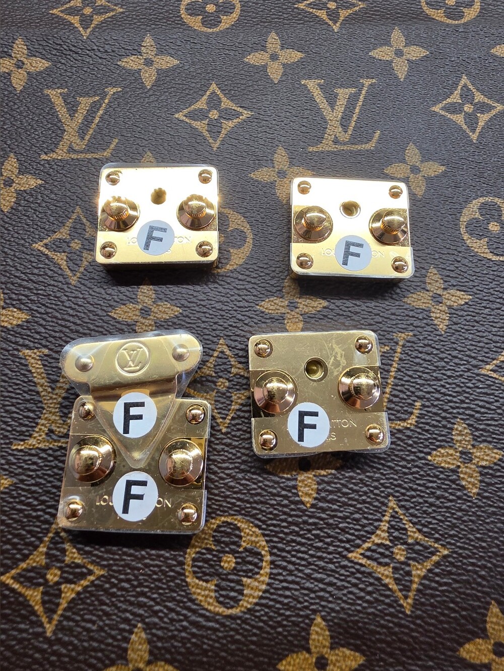 Louis Vuitton Gold Hardware Lock